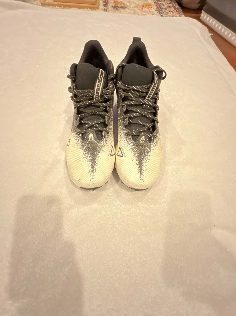 Under Armour Spotlight Franchise RM 2.0 Football Cleats, Black and White, Men's